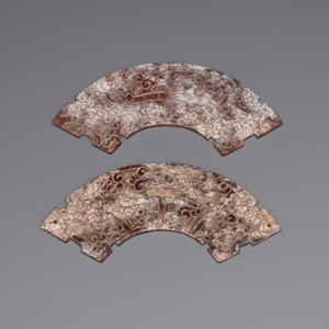 A varied collection of nine Chinese archaistic jade and stone carvings, 20th C. — photo 2