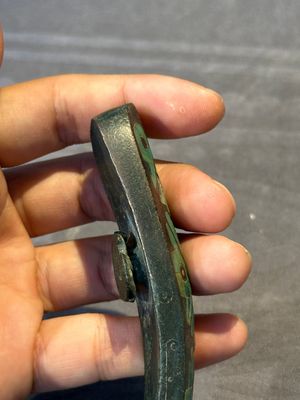 A varied collection of six Chinese bronze belt hooks, Warring States period and Western Han — photo 17