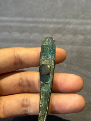 A varied collection of six Chinese bronze belt hooks, Warring States period and Western Han — photo 23