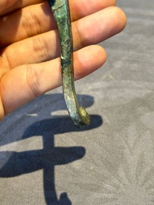 A varied collection of six Chinese bronze belt hooks, Warring States period and Western Han — photo 25