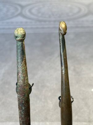 A varied collection of six Chinese bronze belt hooks, Warring States period and Western Han — photo 29