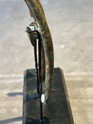 A varied collection of six Chinese bronze belt hooks, Warring States period and Western Han — photo 32
