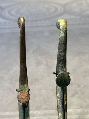 A varied collection of six Chinese bronze belt hooks, Warring States period and Western Han — photo 33