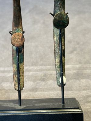 A varied collection of six Chinese bronze belt hooks, Warring States period and Western Han — photo 34