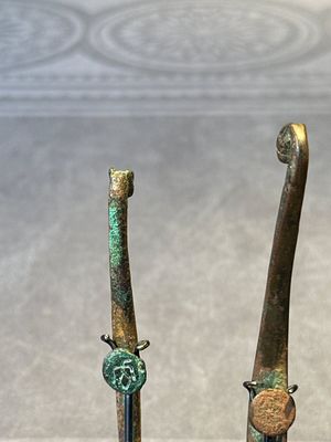 A varied collection of six Chinese bronze belt hooks, Warring States period and Western Han — photo 36