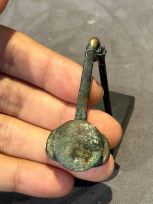 A varied collection of six Chinese bronze belt hooks, Warring States period and Western Han — photo 4