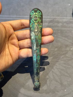 A varied collection of six Chinese bronze belt hooks, Warring States period and Western Han — photo 5