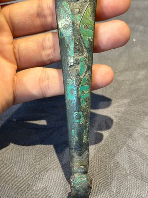A varied collection of six Chinese bronze belt hooks, Warring States period and Western Han — photo 8