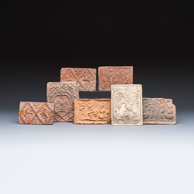A varied group of seven fireplace tiles, France and Flanders, 16/19th C.