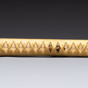 A varied group of six Japanese koshirae components or sword fittings, Edo — photo 2