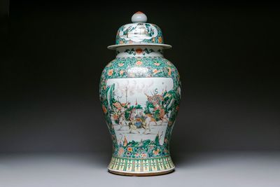 A very large Chinese famille verte 'warriors on horseback' vase and cover, 19th C.