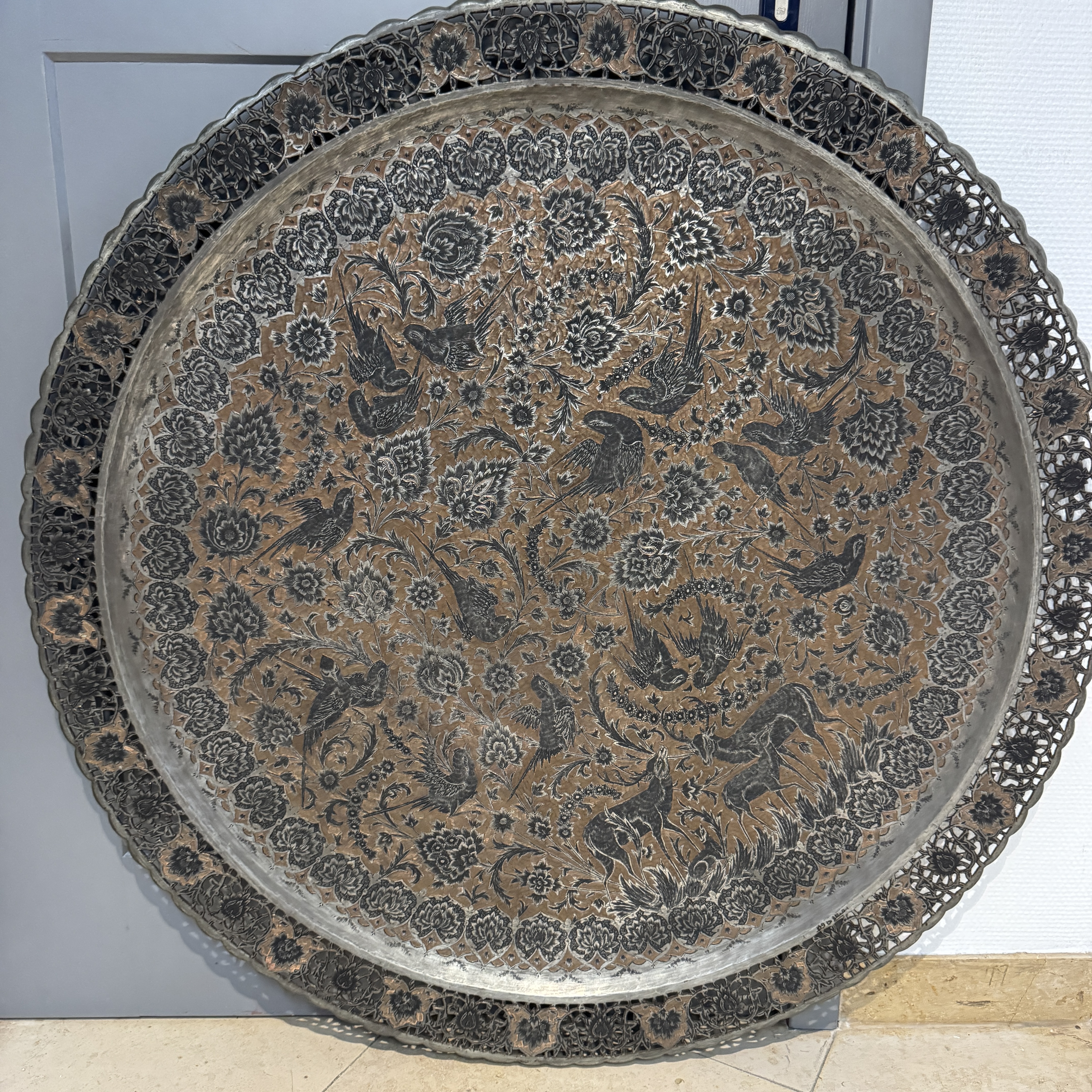 A very large Persian engraved tinned-copper tray with birds among flowers — photo 1
