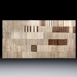A very large Persian hand-knotted woollen carpet with a geometric patchwork design, 20th C. — photo 1