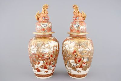 A very tall pair of Japanese Satsuma vases and covers, 19th C.