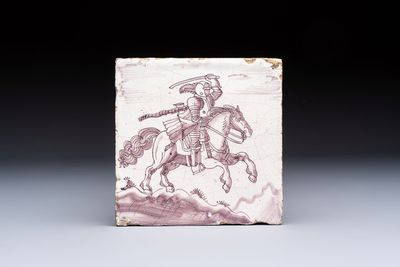 A very unusual manganese Dutch Delft 'Knight on Horseback in Open Air' tile, late 17th C.