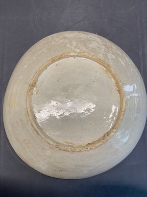 A Vietnamese or Annamese relief-molded blue, white and orange 'dragon' dish, 19th C. — photo 5