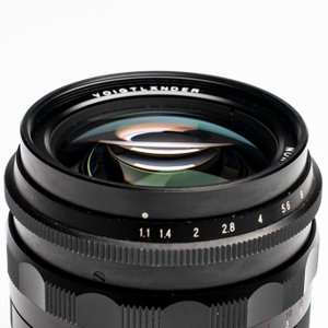 A Voigtländer Nokton 50 mm F1.1 lens and hood — photo 3
