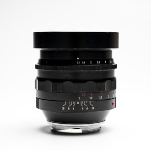 A Voigtländer Nokton 50 mm F1.1 lens and hood — photo 7