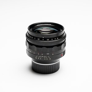 A Voigtländer Nokton 50 mm F1.1 lens and hood — photo 1