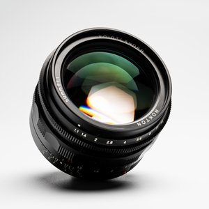 A Voigtländer Nokton 50 mm F1.1 lens and hood — photo 2