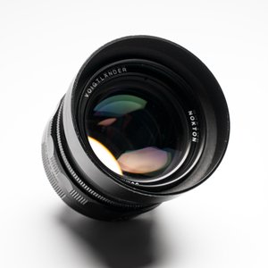 A Voigtländer Nokton 50 mm F1.1 lens and hood — photo 4