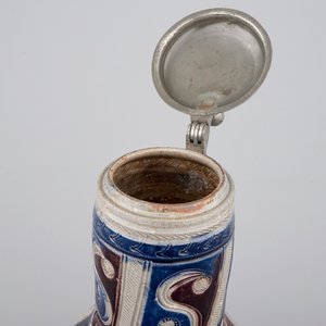 A Westerwald pewter-mounted jug in manganese and blue, 17th C. — photo 6