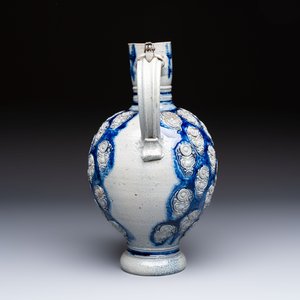 A Westerwald stoneware jug with a lion's head and moulded floral design, Germany, 17th C. — photo 3