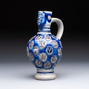 A Westerwald stoneware jug with a lion's head and moulded floral design, Germany, 17th C. — photo 1