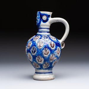 A Westerwald stoneware jug with a lion's head and moulded floral design, Germany, 17th C. — photo 2