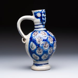 A Westerwald stoneware jug with a lion's head and moulded floral design, Germany, 17th C. — photo 4