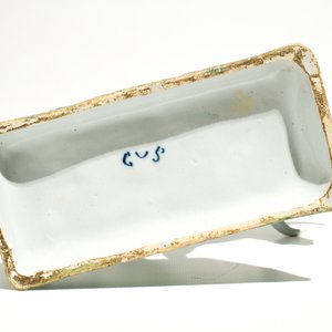 A white Dutch Delft model of a cow on a green base, 18th C. — 照片 7