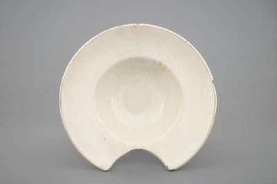 A white French faience shaving bowl, 19th C.