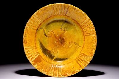 Alfred William Finch (1854 –1930): A large yellow-glazed slip-decorated ceramic dish