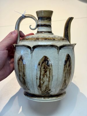 An Annamese or Vietnamese brown-glazed cream-ground 'lotus' ewer, 14th C. — photo 1