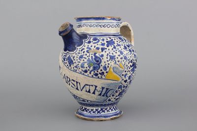 An early Antwerp maiolica blue, yellow and white syrup jar with sgraffiato decor, 1540-1580