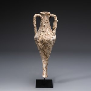 An early Greek pottery wine transport amphora with marine encrustation — photo 1