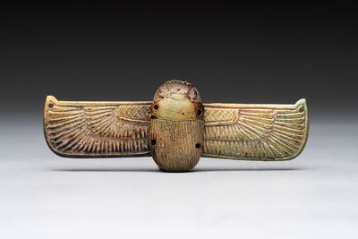 An Egyptian turquoise-glazed composition winged scarab, Ptolemaic, 4/1st C. B.C.