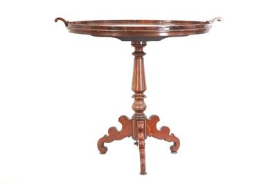 An English oval inlaid tea table, 19th C.