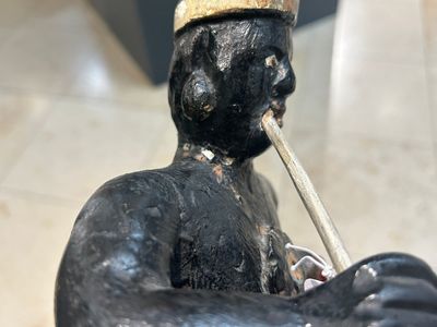An English polychromed wood sculpture of a pipe-smoking Indian from a tobacco store, 18th C. — photo 13