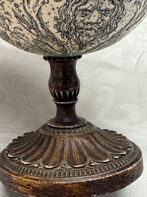 An engraved ostrich egg with a maritime scene on a wooden stand — photo 13