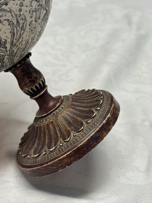 An engraved ostrich egg with a maritime scene on a wooden stand — photo 6