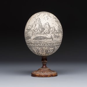 An engraved ostrich egg with a maritime scene on a wooden stand — photo 2