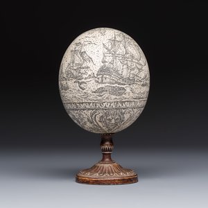 An engraved ostrich egg with a maritime scene on a wooden stand — photo 3