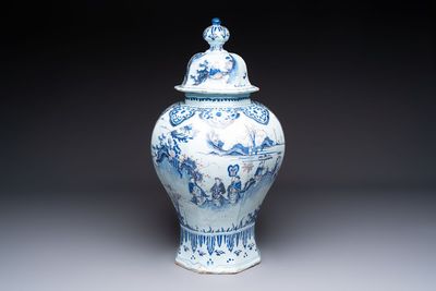 An exceptional blue, white and manganese Dutch Delft Transitional style chinoiserie vase and cover, 17th C.