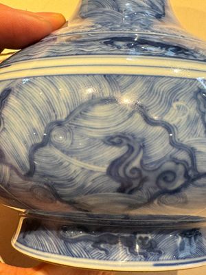 An exceptional Chinese blue and white 'mythic animals' garlic-mouth bottle vase on wooden stand, Kangxi mark and of the period — photo 11