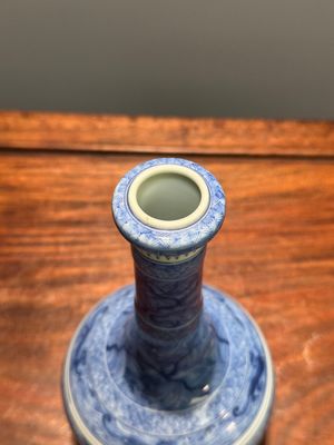 An exceptional Chinese blue and white 'mythic animals' garlic-mouth bottle vase on wooden stand, Kangxi mark and of the period — photo 26