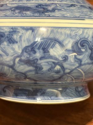 An exceptional Chinese blue and white 'mythic animals' garlic-mouth bottle vase on wooden stand, Kangxi mark and of the period — photo 33