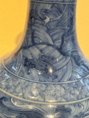 An exceptional Chinese blue and white 'mythic animals' garlic-mouth bottle vase on wooden stand, Kangxi mark and of the period — photo 8