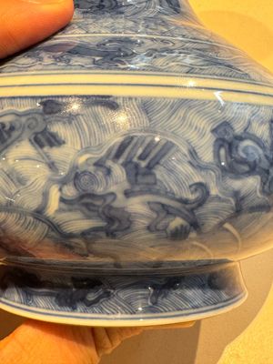 An exceptional Chinese blue and white 'mythic animals' garlic-mouth bottle vase on wooden stand, Kangxi mark and of the period — photo 9