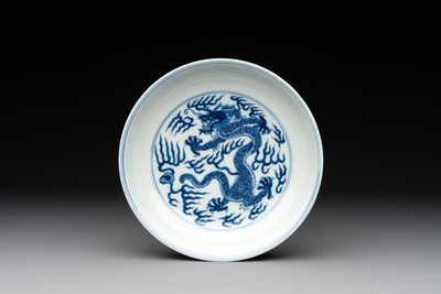 An imperial Chinese blue and white 'dragon' plate, Qianlong mark and of the period